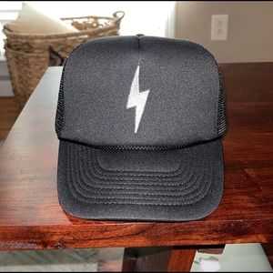 Black trucker hat with a sparkly lightening bolt